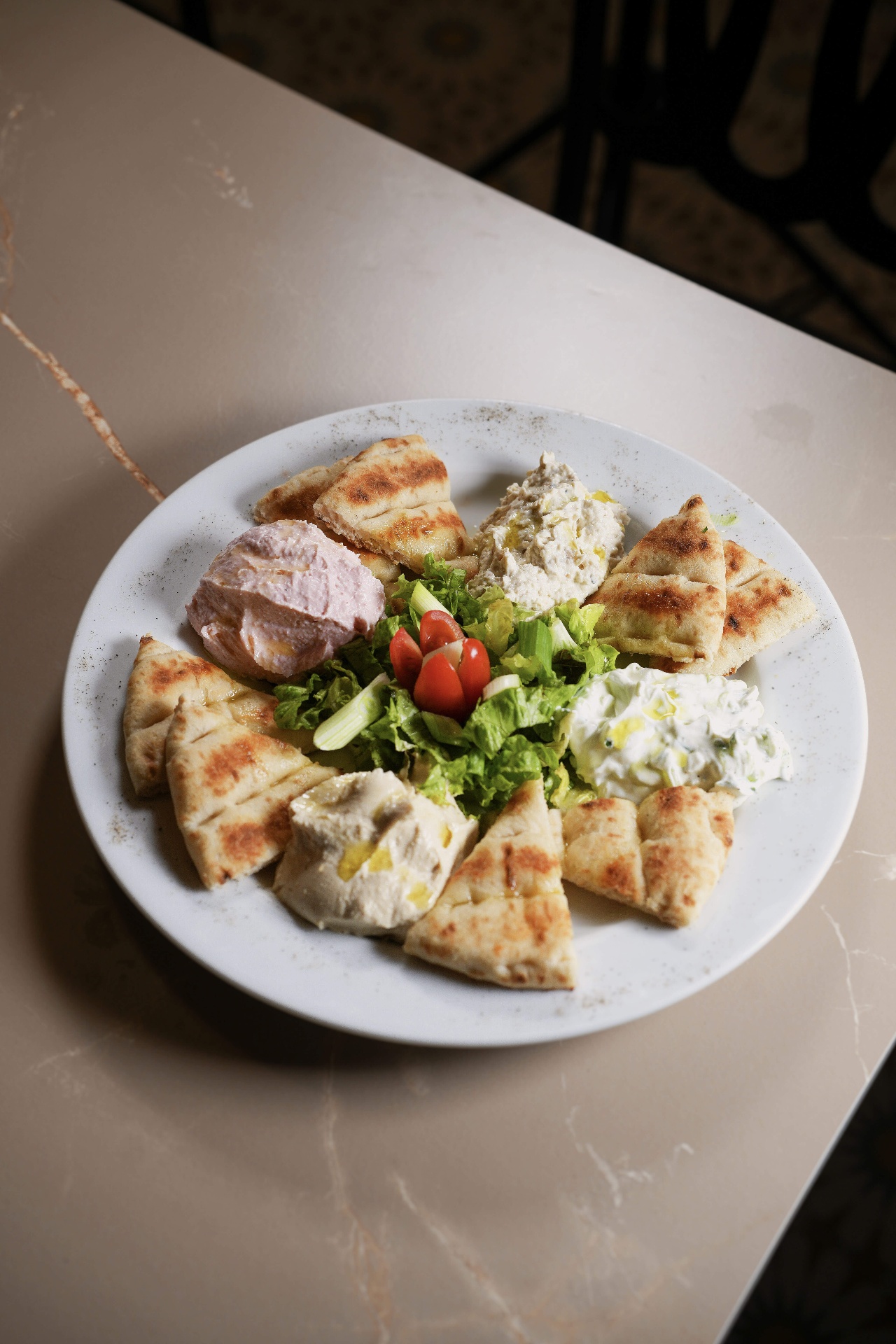 Taramasalata, hummus and tzatziki with pita